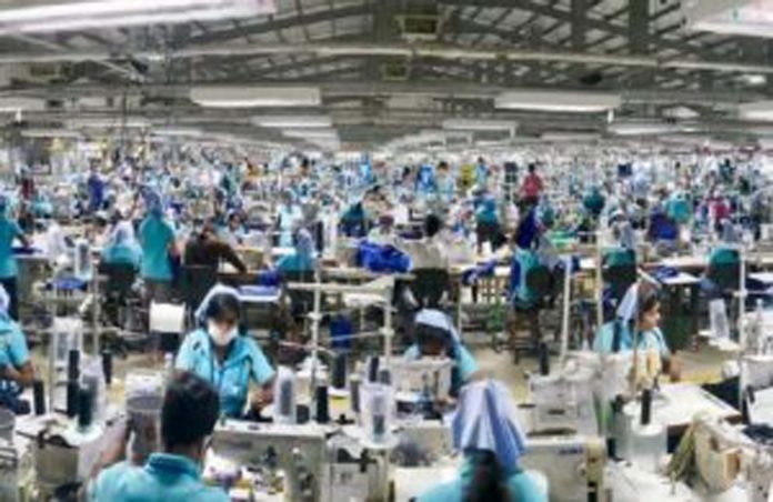 garment worker 647x420 1 300x195 1