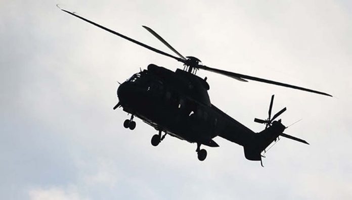 fugitive in New Zealand chartered a helicopter to